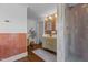 Elegant bathroom showcasing a double vanity sink, tiled shower, and stylish fixtures at 116 W Front St, Oxford, NC 27565