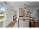 Bright kitchen featuring a wood countertop island, stainless steel sink, and open layout perfect for modern living at 116 W Front St, Oxford, NC 27565