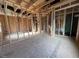 Exposed framing of the living room during the construction process at 12 Gates St, Roxboro, NC 27573