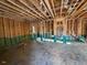 Exposed framing of the living room during the construction process at 12 Gates St, Roxboro, NC 27573
