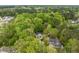 A home set among the trees offering a sense of peacefulness and seclusion at 120 Kerigon Ln, Youngsville, NC 27596