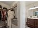Bathroom with a vanity, modern mirror and walk-in closet with storage at 120 Kerigon Ln, Youngsville, NC 27596