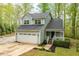 Well-maintained two-story home with a two-car garage and a cozy front porch at 120 Kerigon Ln, Youngsville, NC 27596