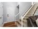 Inviting foyer features hardwood floors, staircase, and a warm welcome at 120 Kerigon Ln, Youngsville, NC 27596