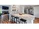 Stylish kitchen features an island with granite countertops and seating at 120 Kerigon Ln, Youngsville, NC 27596