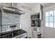 Modern kitchen with stainless steel appliances, microwave, and electric stovetop at 120 Kerigon Ln, Youngsville, NC 27596