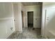 Bathroom with unfinished walls with fixtures and shower, showcasing the design and space at 125 Tee Dr, Selma, NC 27576