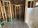 Bathroom under construction with a tub installed, showcasing the home's developing infrastructure at 125 Tee Dr, Selma, NC 27576