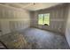 Unfinished bedroom featuring a large window and spacious layout at 125 Tee Dr, Selma, NC 27576