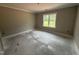 Bedroom with large window providing plenty of natural light at 125 Tee Dr, Selma, NC 27576