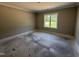 Bedroom with a window that offers natural light, carpet flooring and a ceiling with crown molding at 125 Tee Dr, Selma, NC 27576