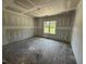 Unfinished bedroom with bright natural light and visible framing, perfect for custom design at 125 Tee Dr, Selma, NC 27576