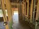 Framed staircase and hallway are being constructed, showcasing the home's developing layout and potential at 125 Tee Dr, Selma, NC 27576