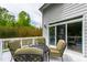Inviting outdoor deck with seating area providing a relaxing space for outdoor enjoyment at 12833 Edsel Dr, Raleigh, NC 27613