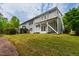 Expansive backyard featuring a multilevel deck perfect for outdoor entertaining at 12833 Edsel Dr, Raleigh, NC 27613