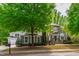 Beautiful home with a three-car garage, well-maintained lawn, and professionally landscaped front yard at 12833 Edsel Dr, Raleigh, NC 27613