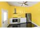 Bright kitchen features stainless appliances, modern cabinets, and an induction cooktop at 12833 Edsel Dr, Raleigh, NC 27613