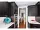 Modern kitchen with built-in oven and ample cabinet space at 12833 Edsel Dr, Raleigh, NC 27613