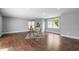 Open living area with hardwood floors, recessed lighting and a cozy atmosphere at 12833 Edsel Dr, Raleigh, NC 27613