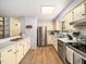 Updated kitchen with stainless steel appliances, and a breakfast bar for entertaining at 1301 Lynnwood Rd, Knightdale, NC 27545