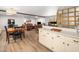 Inviting open-concept living and dining area offers lots of space with hardwood flooring at 1301 Lynnwood Rd, Knightdale, NC 27545