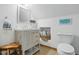 Bright bathroom with a custom vanity and a modern toilet at 13816 N Meadows Ct, Wake Forest, NC 27587