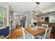 View of the open-concept dining area near the living room and kitchen at 13816 N Meadows Ct, Wake Forest, NC 27587