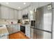 Modern kitchen with stainless steel appliances and granite countertops at 13816 N Meadows Ct, Wake Forest, NC 27587