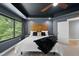 Comfortable bedroom featuring recessed lights, large windows, and stylish modern decor at 1401 Freshwater Ct, Wake Forest, NC 27587