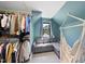 A bedroom closet features a gray couch and hammock at 1401 Freshwater Ct, Wake Forest, NC 27587