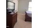 Bedroom showcasing neutral walls and carpet, complemented by dark wood furniture at 141 Steel Hopper Way, Garner, NC 27529