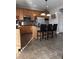 Spacious kitchen boasts stainless steel appliances, granite countertops, bar stool seating, and tile flooring at 141 Steel Hopper Way, Garner, NC 27529