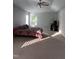 Primary suite showcases vaulted ceilings, neutral walls, fan, and windows for natural lighting at 141 Steel Hopper Way, Garner, NC 27529