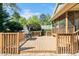 Large wooden deck with grill, perfect for outdoor entertaining at 1433 Deltona Dr, Raleigh, NC 27615