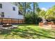 Spacious backyard with a fire pit and deck, ideal for outdoor enjoyment at 1433 Deltona Dr, Raleigh, NC 27615