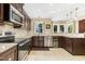Well-equipped kitchen with sleek appliances and custom cabinetry at 1433 Deltona Dr, Raleigh, NC 27615