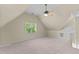 Bedroom with a vaulted ceiling, carpeted floor, a window, a ceiling fan, and a closet at 1526 Town Home Dr, Apex, NC 27502