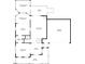 First floor plan of a house showcasing the layout, including the kitchen, living room, dining area, and garage at 1526 Town Home Dr, Apex, NC 27502