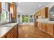 Spacious kitchen featuring wooden cabinets, stainless steel appliances, and natural light at 1526 Town Home Dr, Apex, NC 27502
