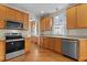 Well-equipped kitchen with stainless steel appliances and ample counter space at 1526 Town Home Dr, Apex, NC 27502