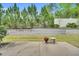 Backyard patio with landscaping, and privacy fence at 153 Telluride Trl, Garner, NC 27529