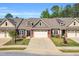 Charming townhome featuring a two-car garage, well-manicured lawn, and tasteful landscaping at 153 Telluride Trl, Garner, NC 27529