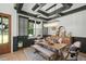 Elegant dining room featuring a coffered ceiling, chandelier, and seating for six at 188 E Antebellum Dr, Pittsboro, NC 27312