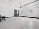 Spacious garage with epoxy floors and bright lighting at 188 E Antebellum Dr, Pittsboro, NC 27312