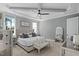 A spacious main bedroom with tray ceilings and a neutral color palette at 188 E Antebellum Dr, Pittsboro, NC 27312