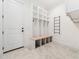 Mudroom features built-in storage and tile flooring at 188 E Antebellum Dr, Pittsboro, NC 27312