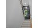 Staircase with wainscoting and black accents at 188 E Antebellum Dr, Pittsboro, NC 27312