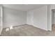 Empty bedroom with carpet, a window and neutral paint at 201 Benton Dr, Oxford, NC 27565