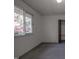 Bedroom featuring a large window with view to the outdoors and a closet for storage at 206 Rochelle Dr, Knightdale, NC 27545