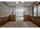Dining area showcasing windows, unique architecture, and carpeted floor at 206 Rochelle Dr, Knightdale, NC 27545